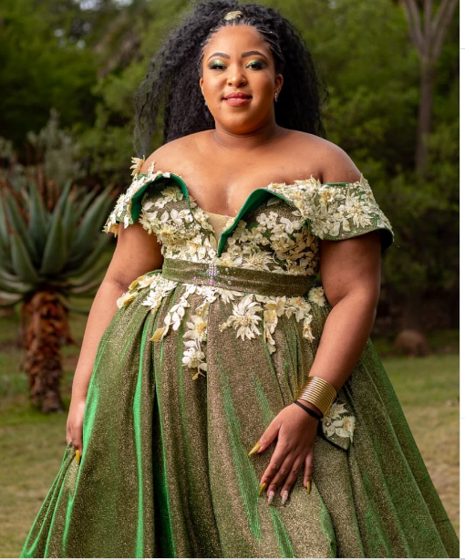 Green plus size wedding dress close up by NIM Couture