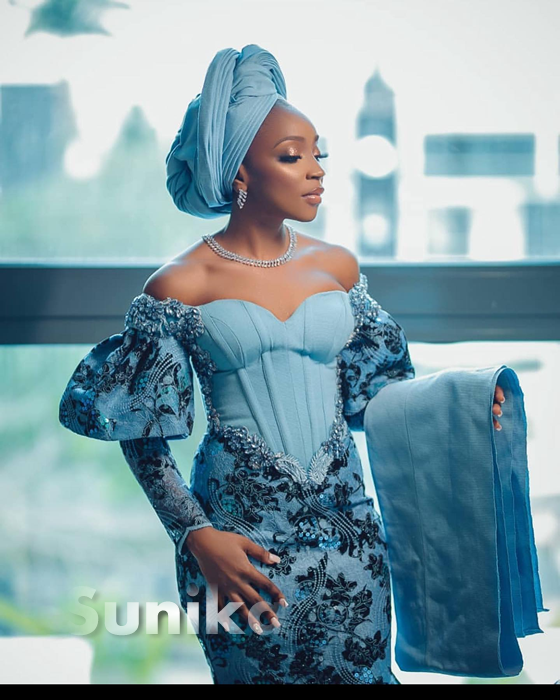 Stunning Baby Blue and Black Nigerian Lace Dress design
