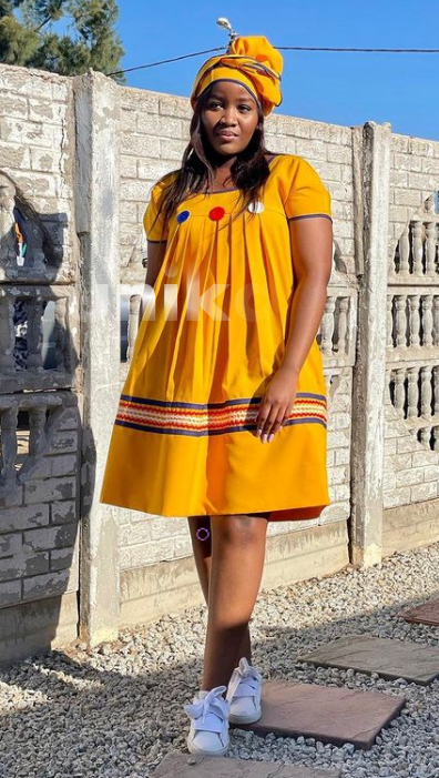 Traditional Yellow Sepedi Dress with covered buttons