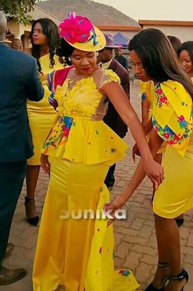 Yellow Traditional Tsonga Wedding Dress with Pink and Yellow Fascianator