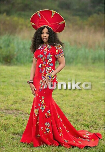 Zulu Bride In Red Print Dress Red Isicholo Hat and Zulu Beads