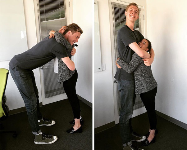 She is half his height