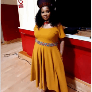 Beige dress with Ndebele waistline Beige dress with Ndebele waistline