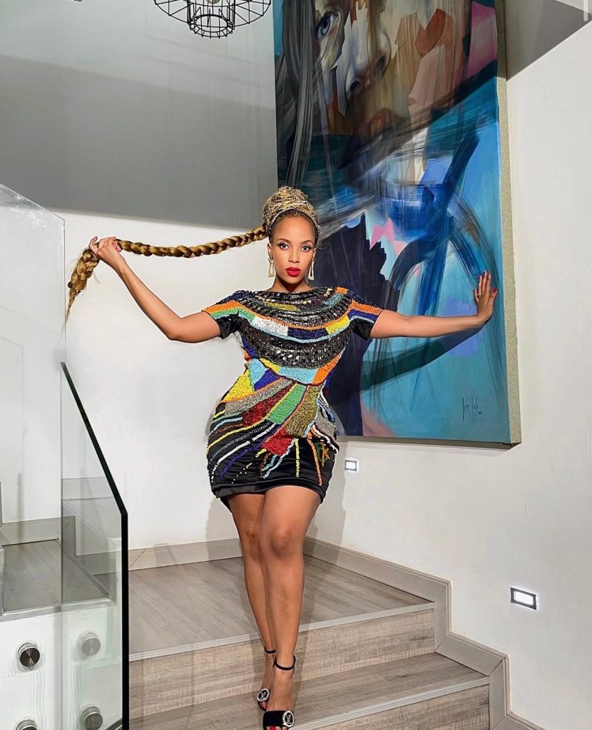 Short beaded black traditional dress by Bayanda Khantini