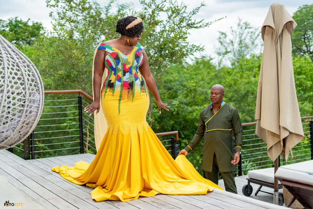 Yellow beaded plus size traditional wedding dress by Bayanda Khantini