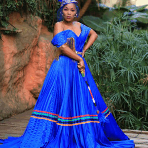 Pleated Pedi Wedding Dress with matching doek by Antherline Couture