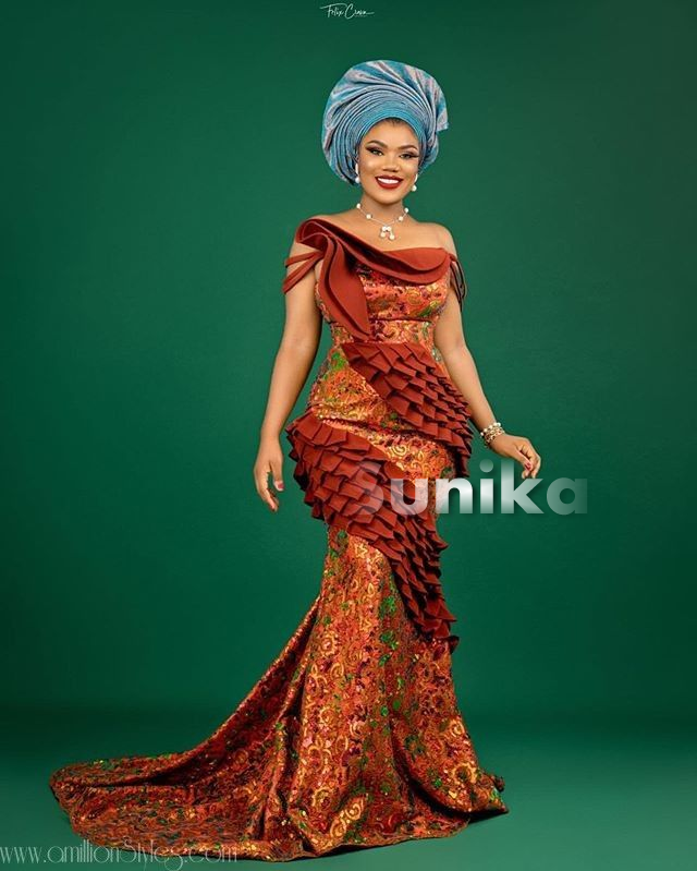 Brown Aso Ebi with Metalic Blue Gele