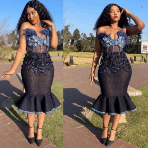 Shweshwe Dress with feather and lace Shweshwe Dress with feathers and lace