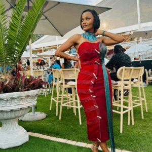 Beautiful Burgundy and Turquoise Xhosa Dress by Tina Ngxokolo