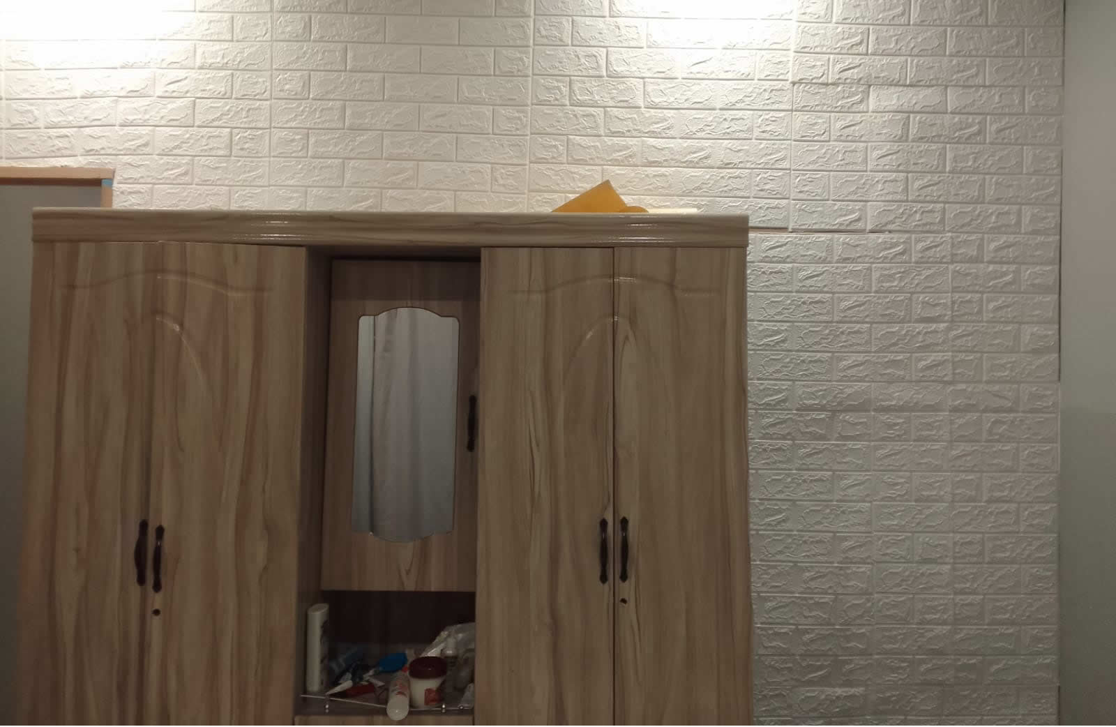 Woman Creates Wall Partition Using Cardboard – A Creative DIY Project