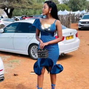 Peplum edges Shweshwe Dress by Yayas Traditional Fashion Attires Peplum edges Shweshwe Dress by Yayas Traditional Fashion Attires